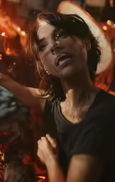 an angry looking woman holding onto a bottle