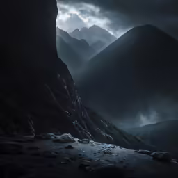 a couple of mountains are shown in the dark