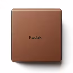a wooden box sitting on top of a white surface