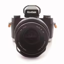 an old kodaka camera with its flash lens