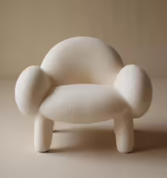 the white chair is shaped like a snake