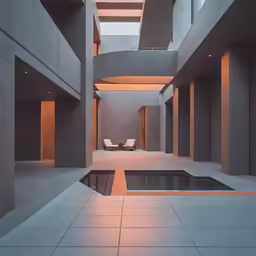 a room with two chairs next to a pool