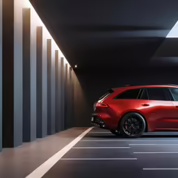 a red suv is in an empty garage with the lights on