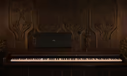 a piano that is sitting in front of a wall