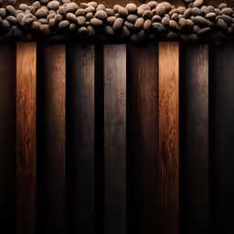 an art deco picture of some pebbles and wood