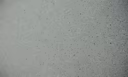 an aerial view shows the sky, including the sun and rain