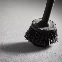 a broom is shown laying on the floor
