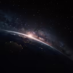 a dark night and the earth seen from space