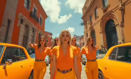 a group of women are posing for the camera