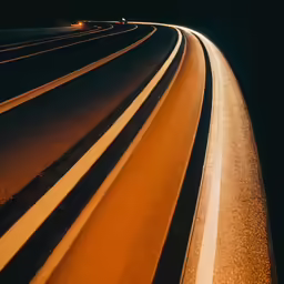 an aerial view of the highway in the night
