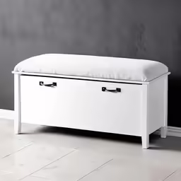 a white bench with drawers underneath it