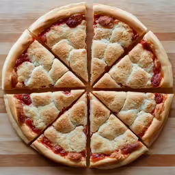 cut into eight pieces of pizza sitting on a counter