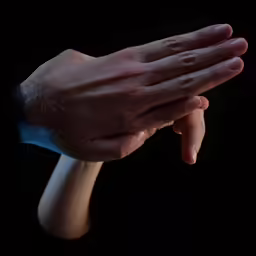 a person with their hand resting on their face
