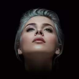 a woman with gray hair looking up into the sky