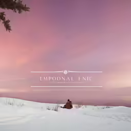 two people standing on top of snow covered slope