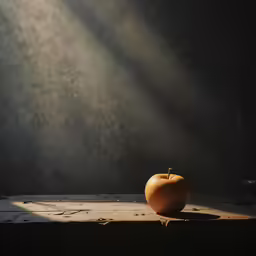 an orange sitting on top of a wooden surface