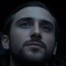 the man has a beard and blue eyes