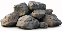 a pile of rocks sitting in front of a white background