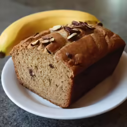 a plate topped with slices of banana bread