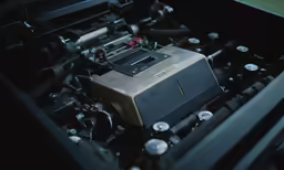 a close - up of the engine and parts in a car