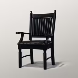 a black chair with arm rest and arms on the other side