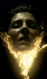 the image shows an alien with fire like eyes