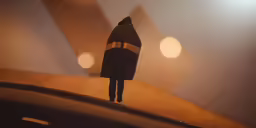 a person in uniform is walking alone at night
