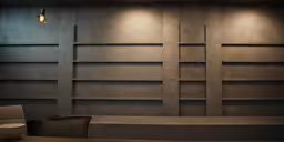 a room with concrete shelves and chairs and lighting