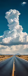 a road with some clouds above it