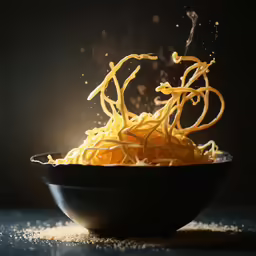 a large bowl full of food with noodles in it