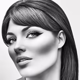 a woman with bangs and black eye makeup