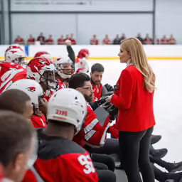 a woman with her head on the ice in a crowd