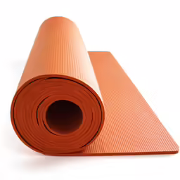 a red exercise mat is shown next to an orange rolled up yoga mat