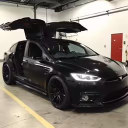 the car has two seats on it in a building