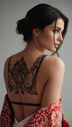 a girl is wearing a black lace bra while holding a red shawl