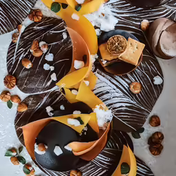 two desserts are on the table ready to be eaten