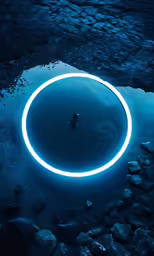 a man is in the water with a circle