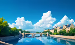 a river runs between two building with a bridge crossing