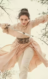 an asian woman with a sword standing next to trees
