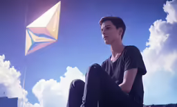 a person sitting on the ground with a kite in the sky