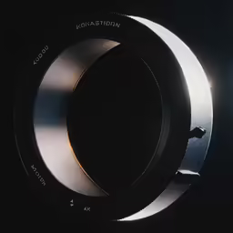 a camera lens on a tripod in the dark
