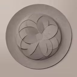 a large circular cut out on top of a plate