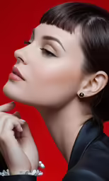 the woman wearing a suit has her eyes closed
