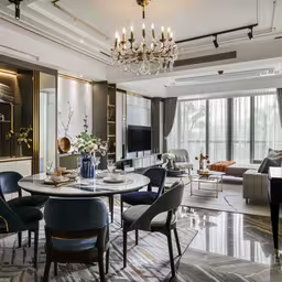 a living room area with furniture and a tv,a modern living room with a large dining table