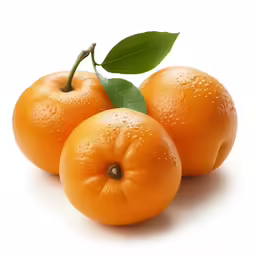 three oranges with leaves on the top of them