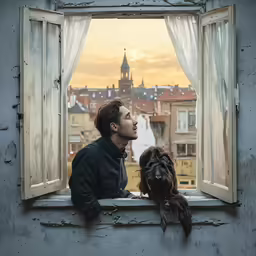 a man is sitting on a windowsill looking at the sky