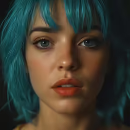 a portrait of a woman with blue hair, makeup and hair color
