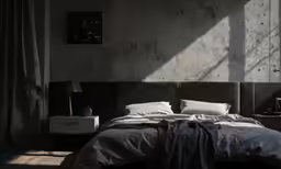a view of a bed in a bedroom