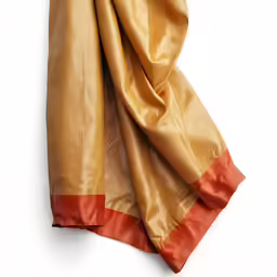 an old golden silk scarf with red stripes