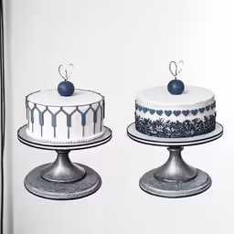two cakes decorated with blue decorations on white and silver serving trays
